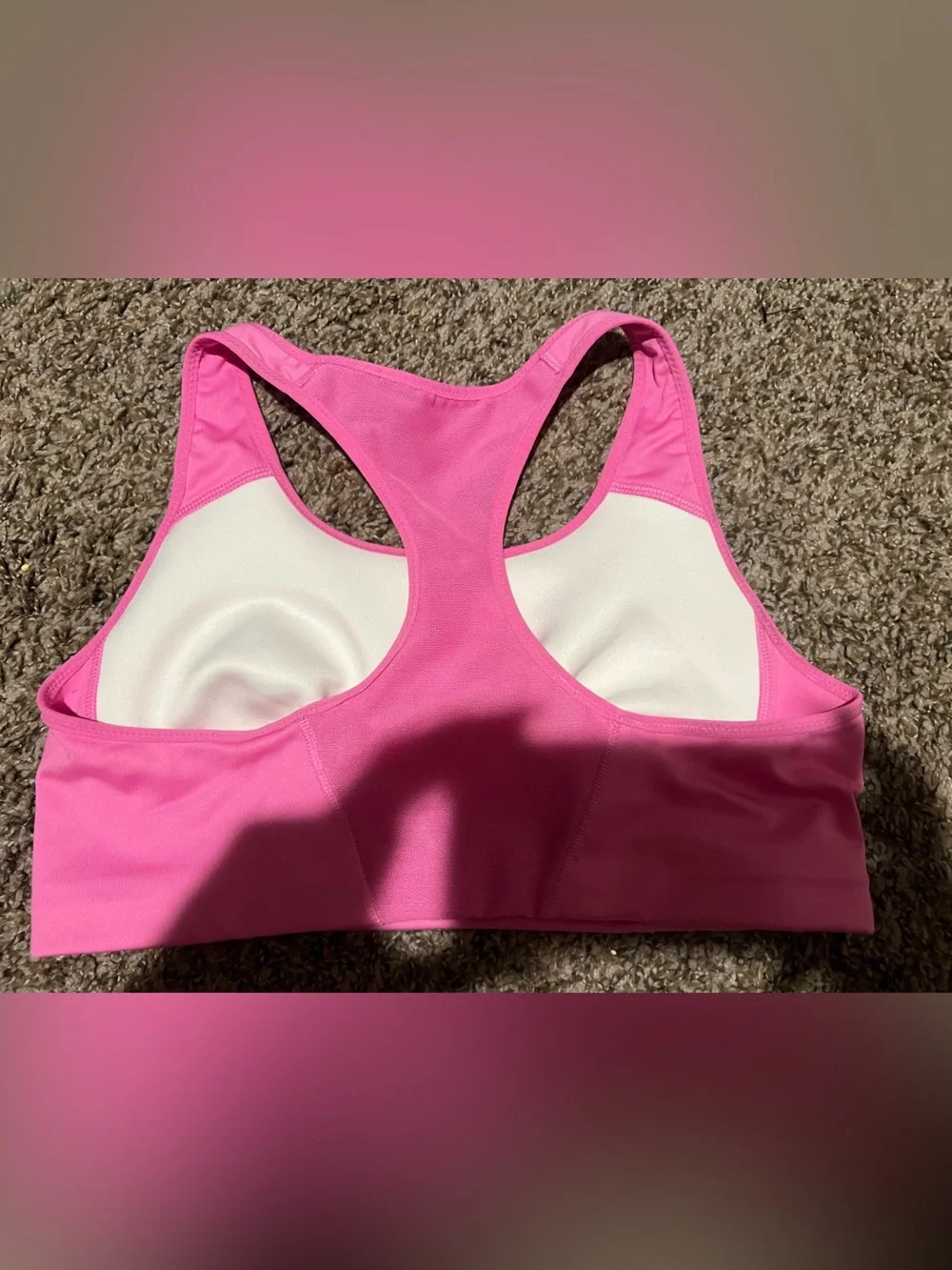 Nike Pink Racerback sports bra with White Swoosh